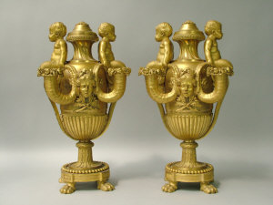 Appraisal: A pair of French gilt bronze four branch candelabra th