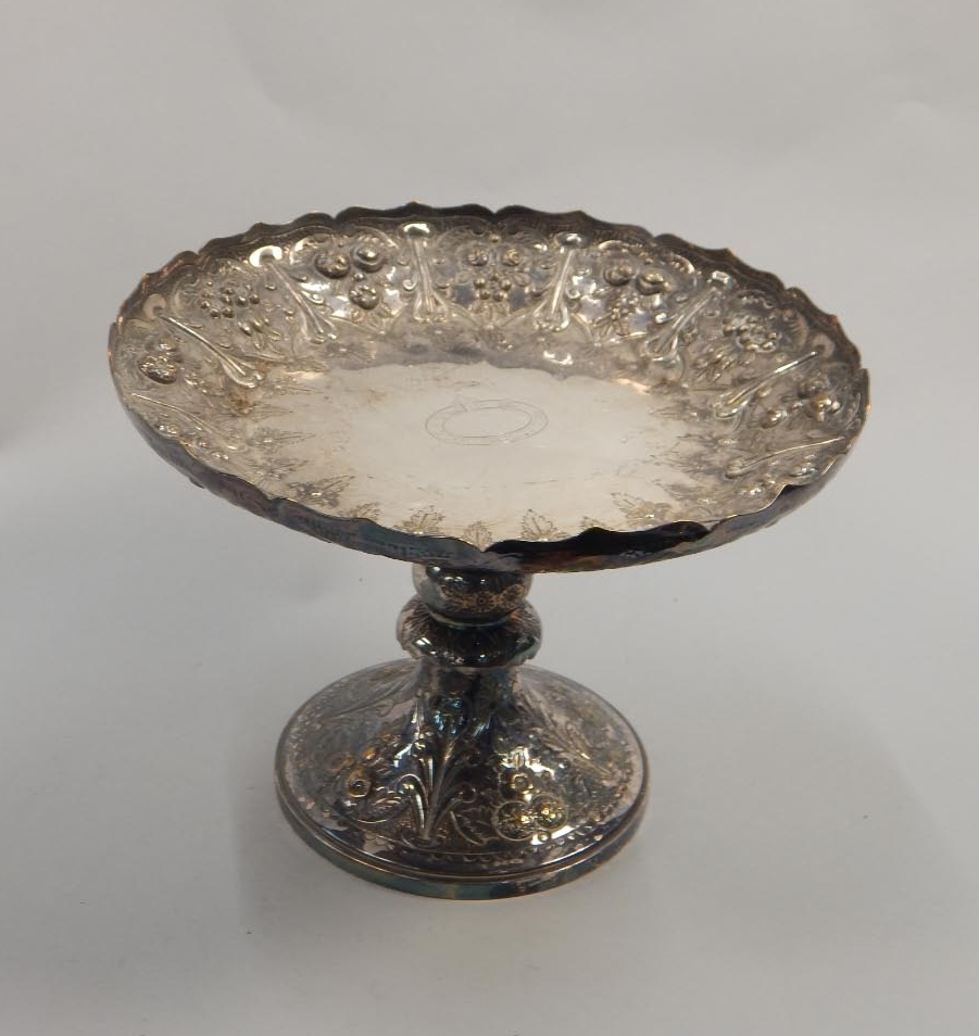 Appraisal: A Walker Hall silver plated centrepiece with an embossed decoration