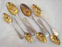 Appraisal: Georgian and Victorian ''berry'' spoons A pair of Fiddle tablespoons