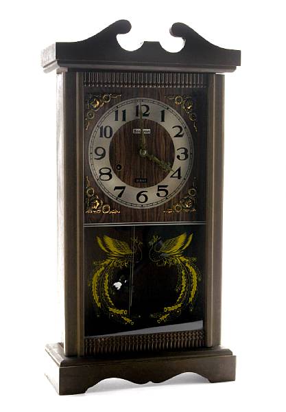 Appraisal: An Art Deco mantel clock together with a wall clock