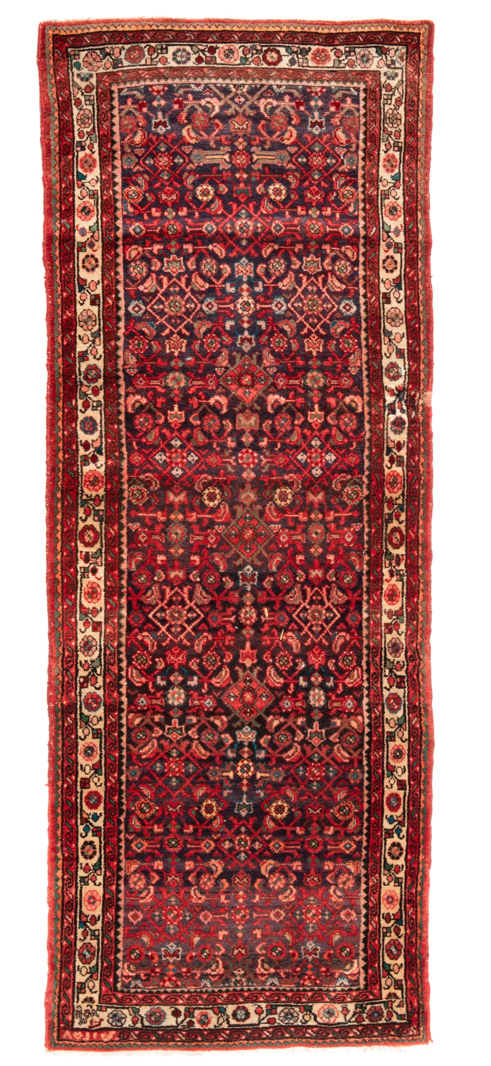 Appraisal: A Persian runner Mid- th century Wool on cotton foundation