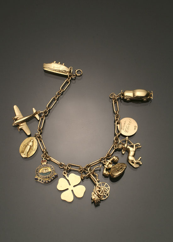 Appraisal: -Karat Yellow-Gold Charm Bracelet Suspending ten -karat yellow-gold commemorative charms