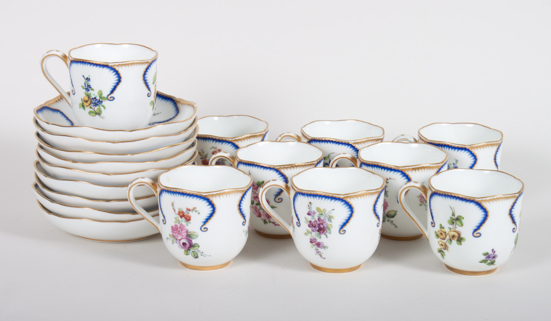 Appraisal: Nine pseudo Sevres porcelain cups and saucers some with pseudo