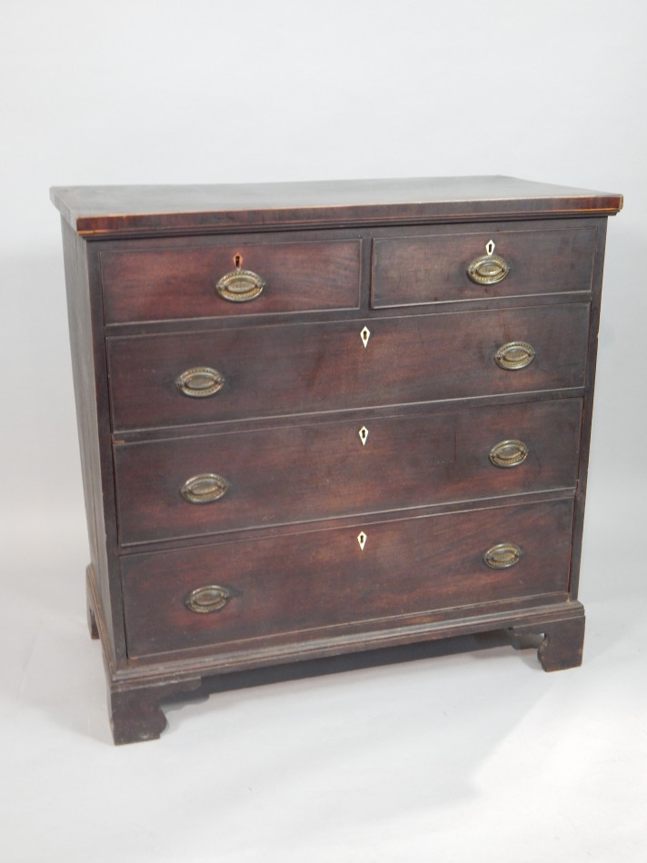 Appraisal: A late George III mahogany chest the crossbanded and boxwood