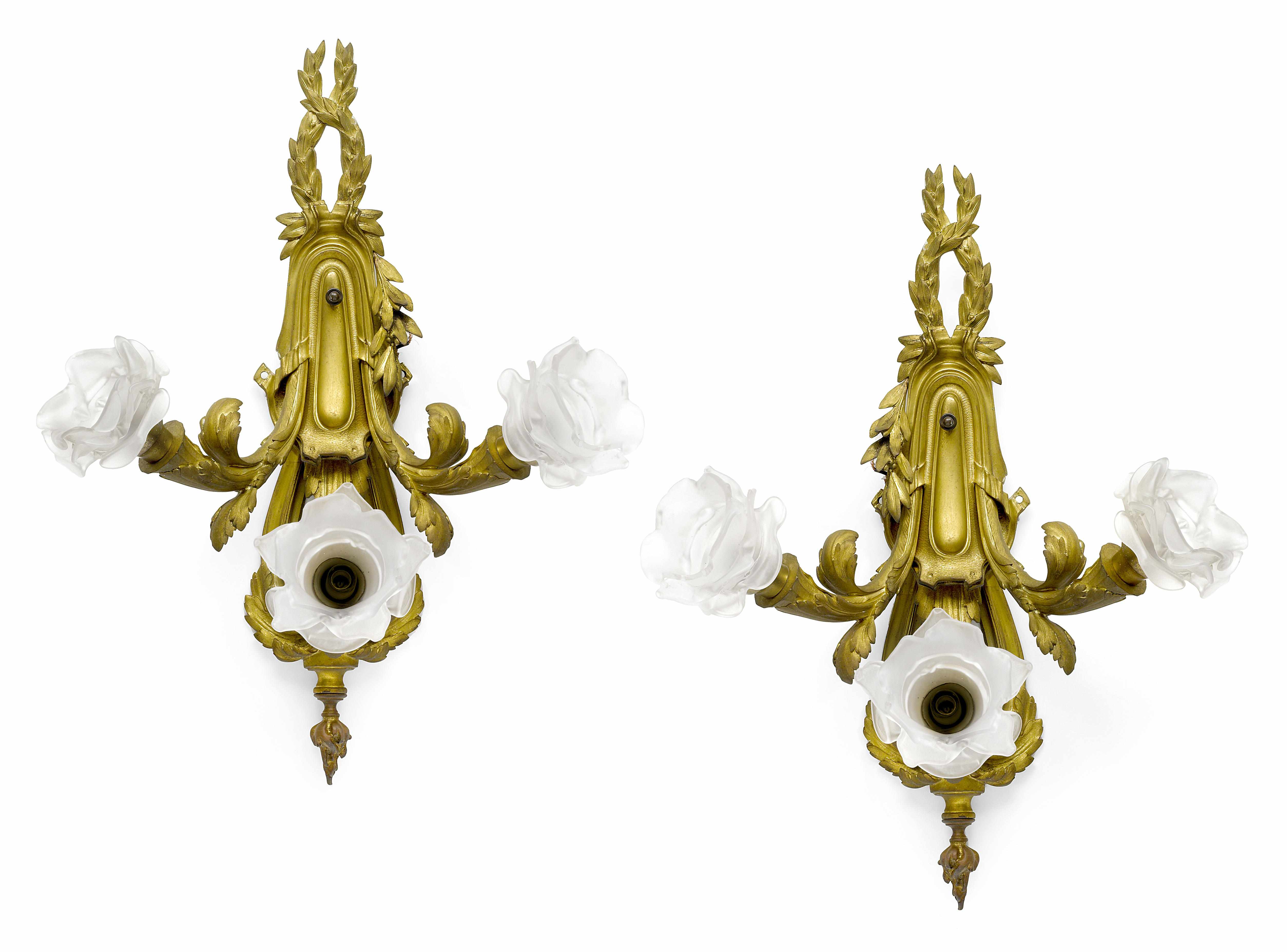 Appraisal: A pair of French gilt bronze three light wall sconces