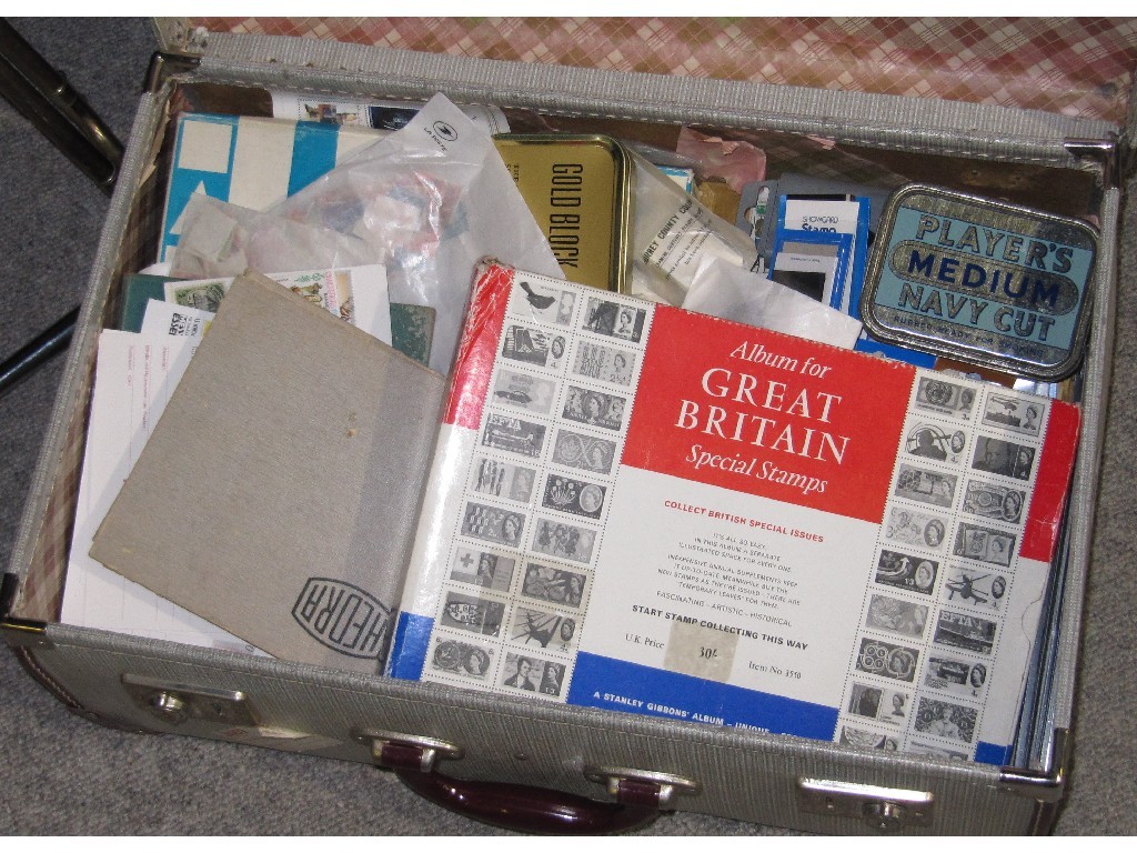 Appraisal: Suitcase of albums of stamps loose stamps and philately ephemera