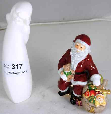 Appraisal: Royal Doulton Figures Santa Holiday Traditions and Images Figure Darling