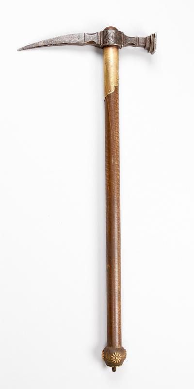 Appraisal: An iron axe An iron axe with hammer and picker