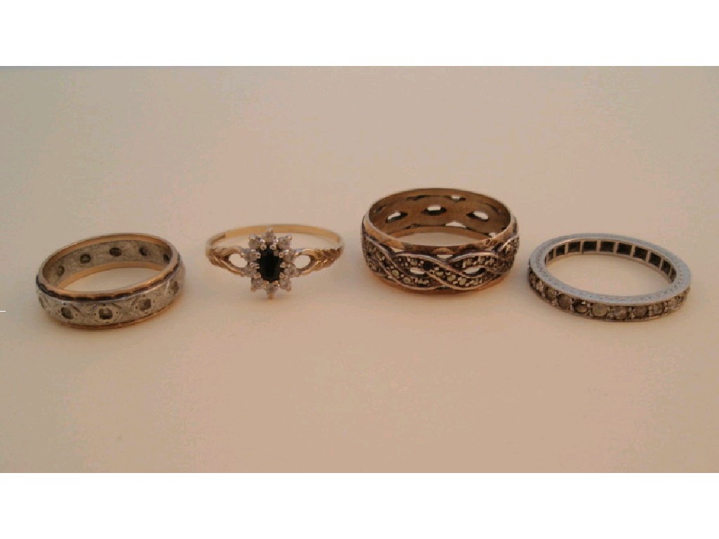 Appraisal: Four stone set dress rings low grade precious metal