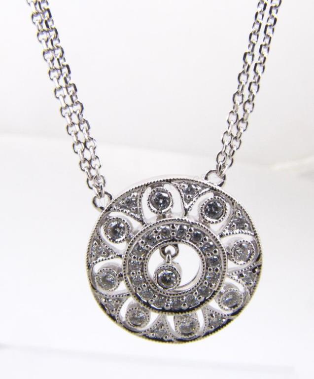 Appraisal: A K white gold necklace with a double chain with