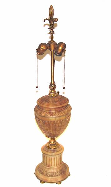 Appraisal: A Neoclassical style gilt metal mounted carved alabaster lamp height