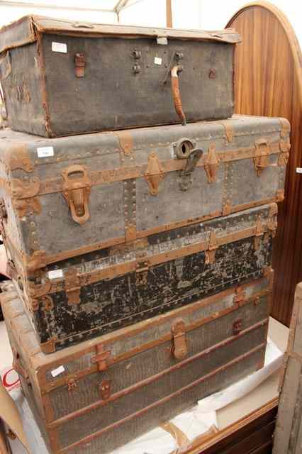 Appraisal: FOUR VARIOUS EARLY TH CENTURY PACKING TRUNKS to include one