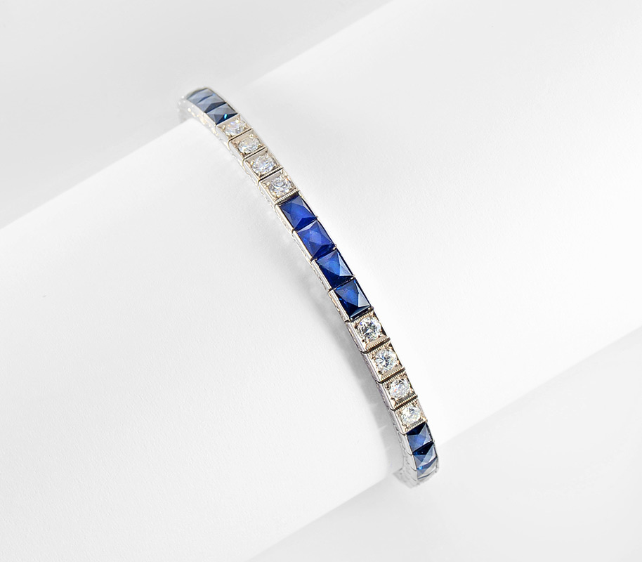 Appraisal: PLATINUM DIAMOND AND SAPPHIRE LINE BRACELET Art Deco at its