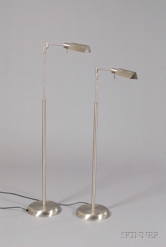 Appraisal: Two Contemporary Floor Lamps Polished steel Spain Triangular illuminator cover