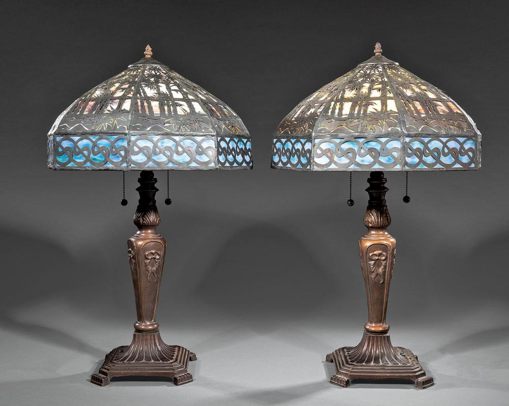 Appraisal: Pair of Bronzed Metal and Slag Glass Lamps th c