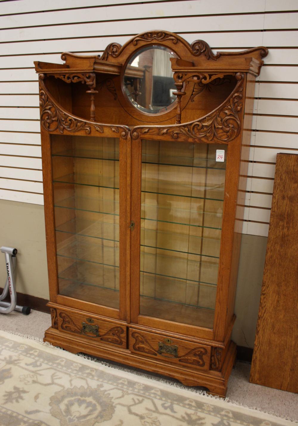 Appraisal: LATE VICTORIAN CARVED OAK CABINET BOOKCASE Forbes Breeden Furniture Portland