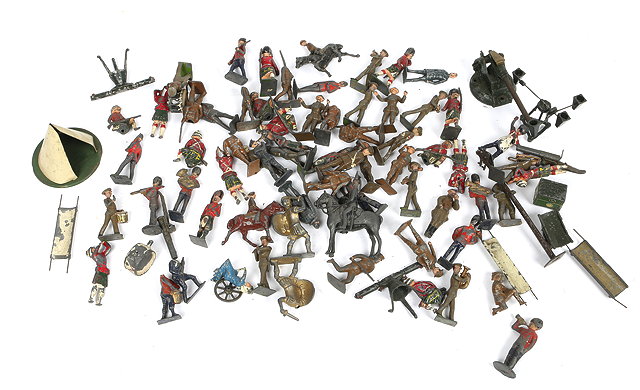 Appraisal: A QUANTITY OF PLAY WORN DIE CAST SOLDIERS many by