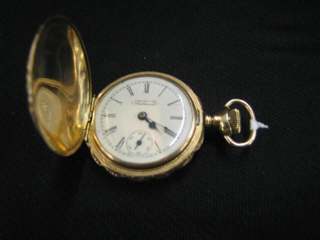 Appraisal: Waltham Ladies Pendant Watch ornate gold-filled case with birds foilage