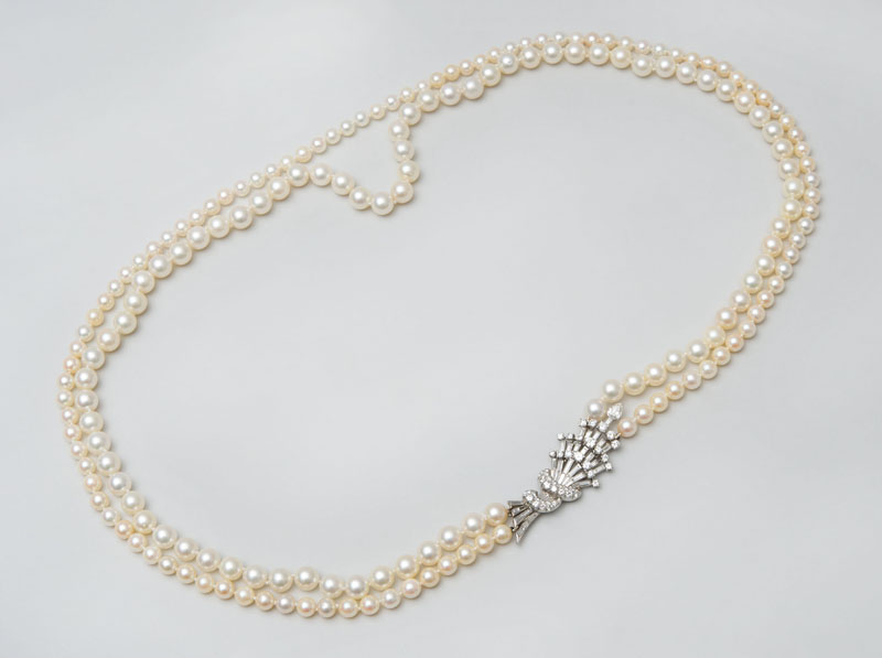 Appraisal: CULTURED PEARL AND DIAMOND NECKLACE Double strand necklace composed of