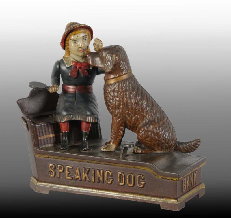 Appraisal: Cast Iron Speaking Dog Blue Dress Mechanical Bank Description Manufactured