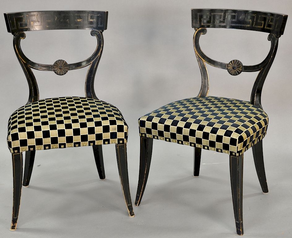 Appraisal: Pair of contemporary black and gilt side chairs in a