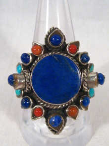 Appraisal: A Mexican silver ring set with lapis lazuli