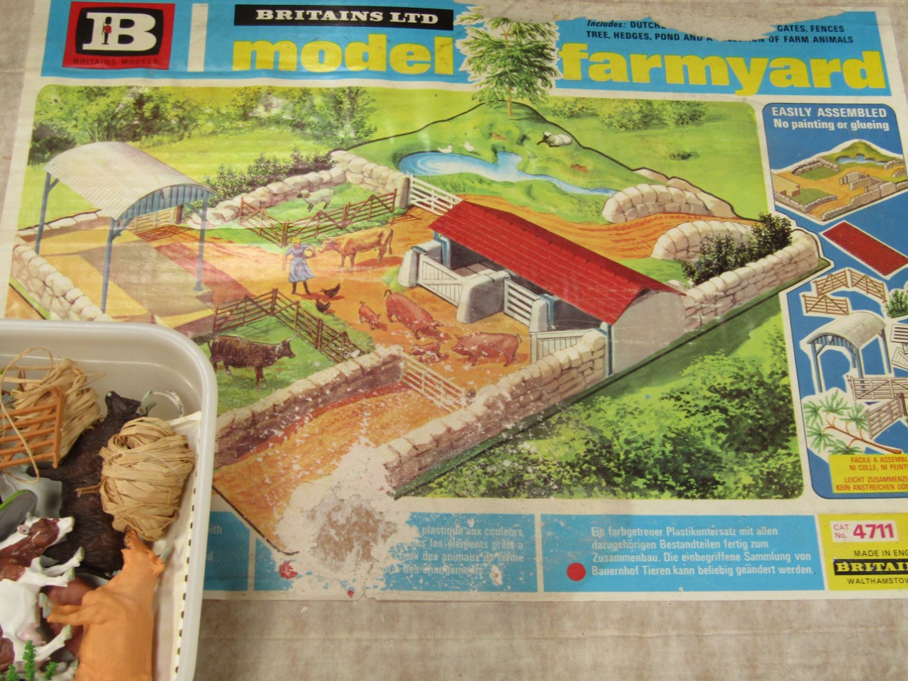 Appraisal: A Britains model farm boxed and sundry farm animals fencing