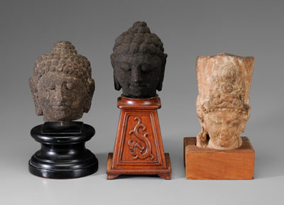 Appraisal: Three Carved Stone Heads Indonesian th century or earlier two