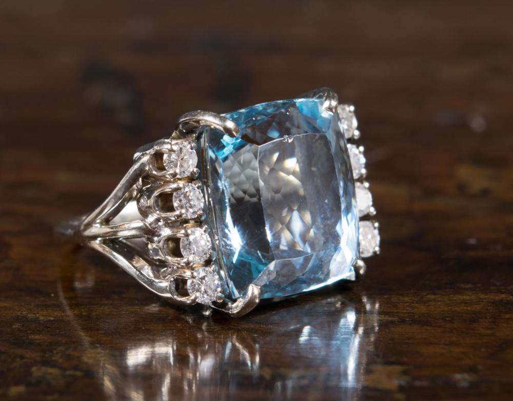 Appraisal: AQUAMARINE DIAMOND AND FOURTEEN KARAT GOLD RING The large k