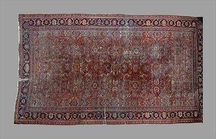 Appraisal: BIDJAR CARPET The wine red field with trellis overlay within