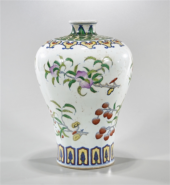 Appraisal: Chinese doucai porcelain vase with fruit and flower motif Qianlong