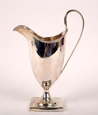 Appraisal: A George III silver helmet-shaped cream jug Hester Bateman London