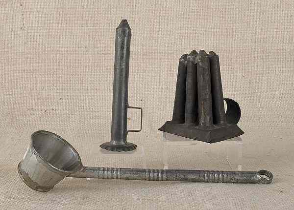 Appraisal: Two tin taper stick candlemolds th c h h together