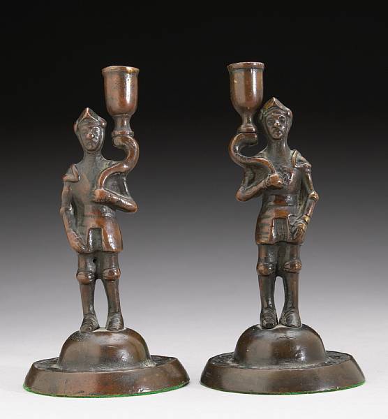 Appraisal: A pair of Flemish late Renaissance figural bronze candlesticks first