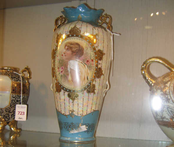 Appraisal: CONTINENTAL DOUBLE HANDLED PORTRAIT VASE Showing a profile portrait of