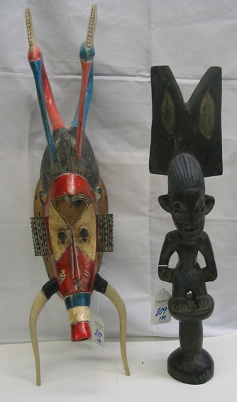 Appraisal: TWO AFRICAN WOOD CARVED PIECES an oath taking staff of