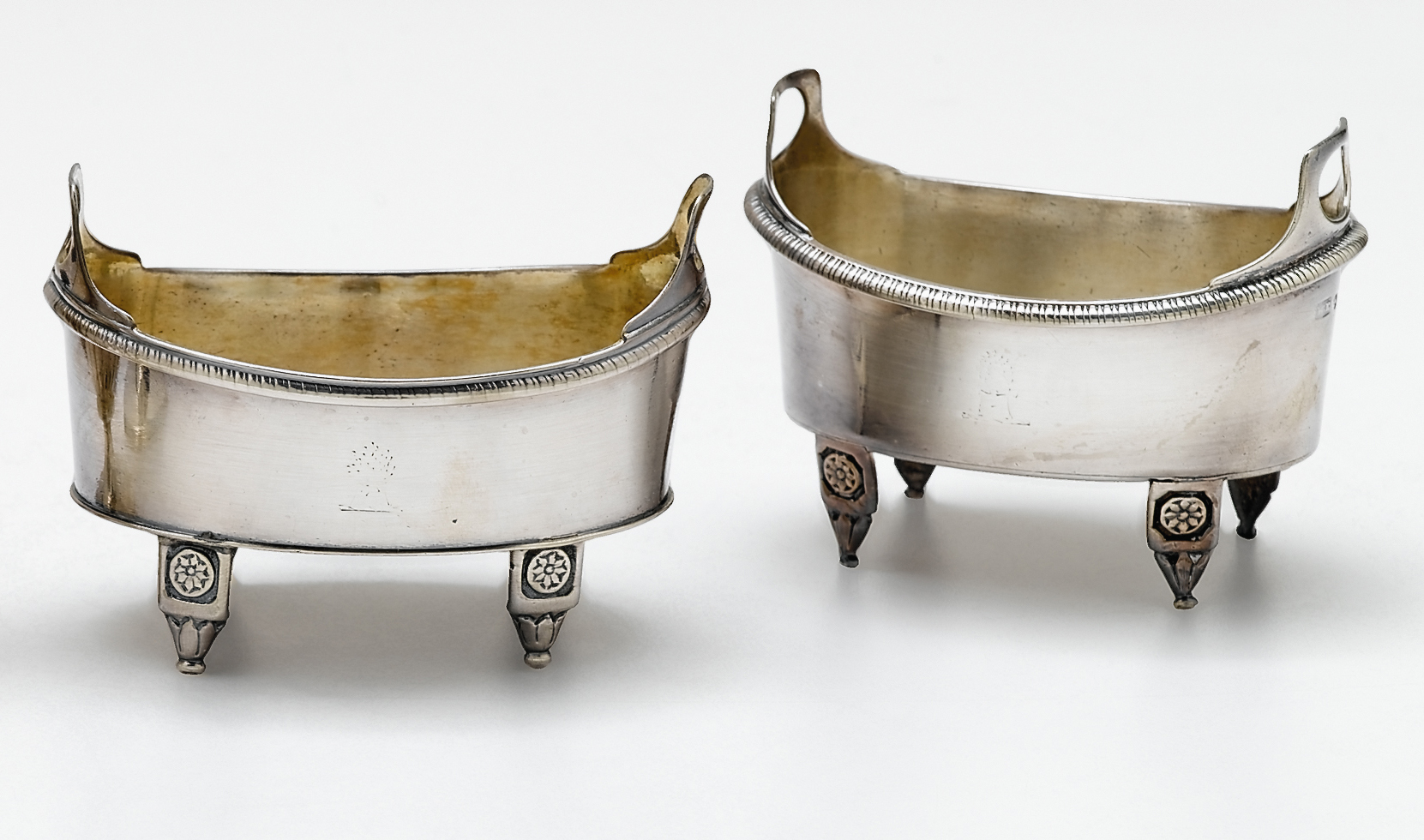 Appraisal: Matched pair of George III neoclassical style sterling silver salts