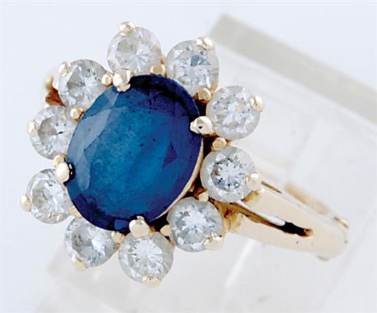 Appraisal: Sapphire and diamond cocktail ring ct oval blue sapphire surrounded