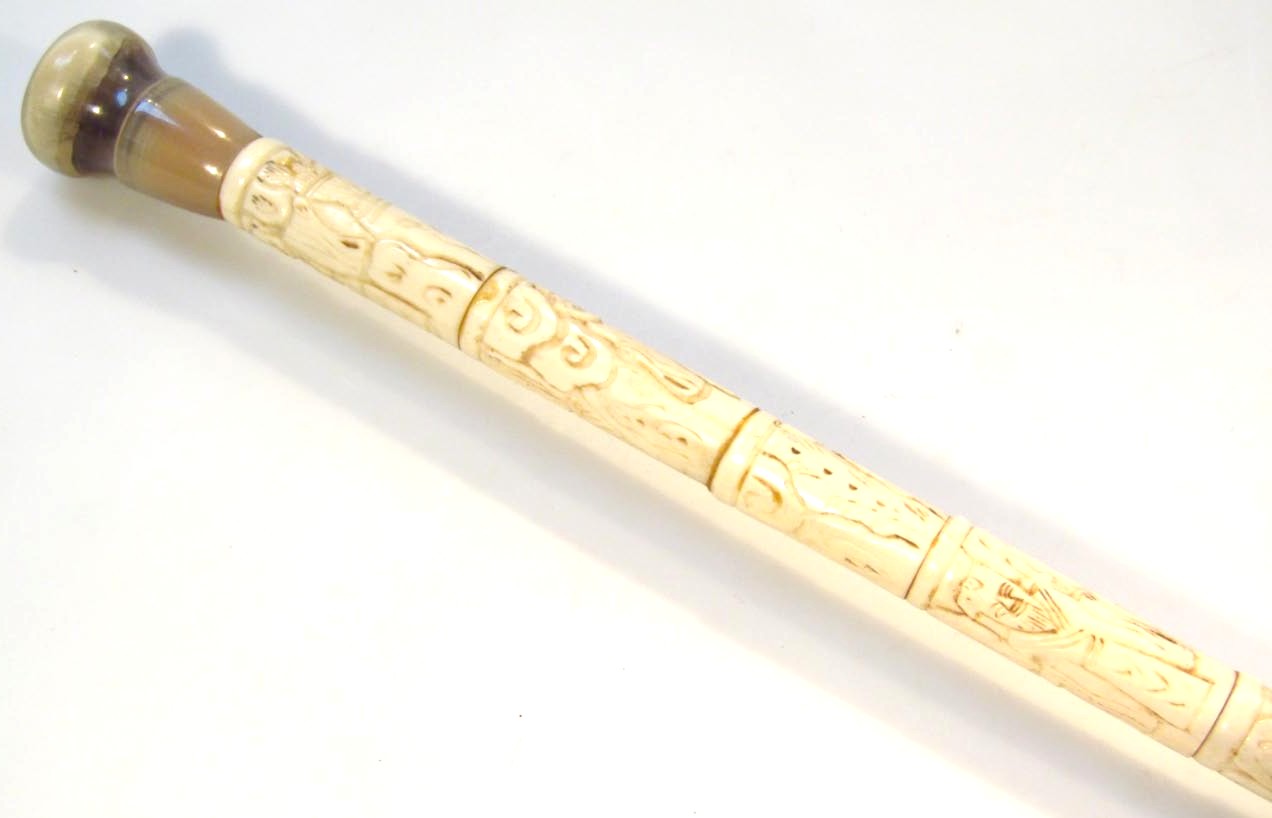 Appraisal: A faux ivory and jade style walking stick with inverted