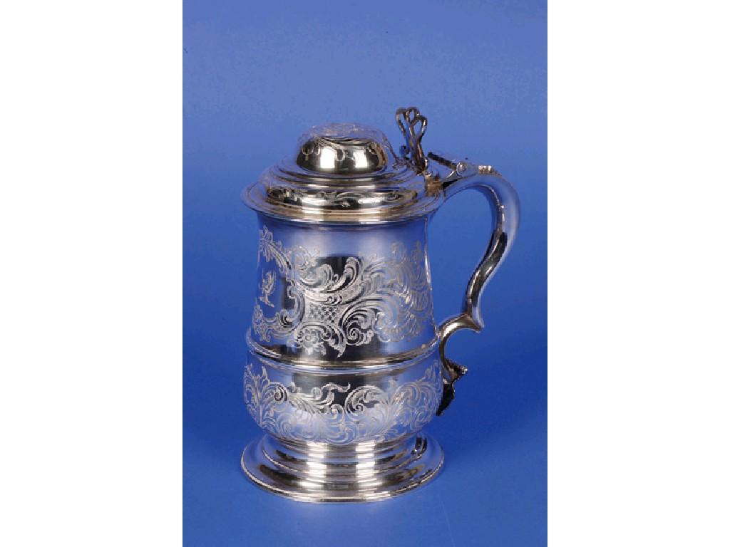 Appraisal: A GEORGE III LIDDED TANKARD of baluster form with domed