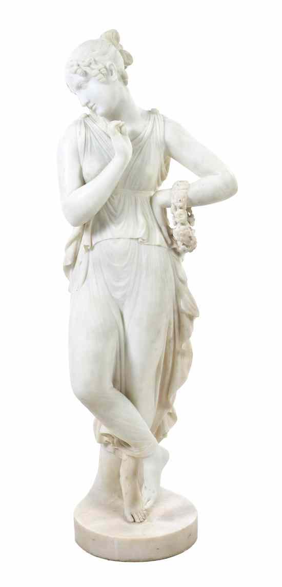 Appraisal: An Italian Marble Sculpture depicting a classically robed maiden with