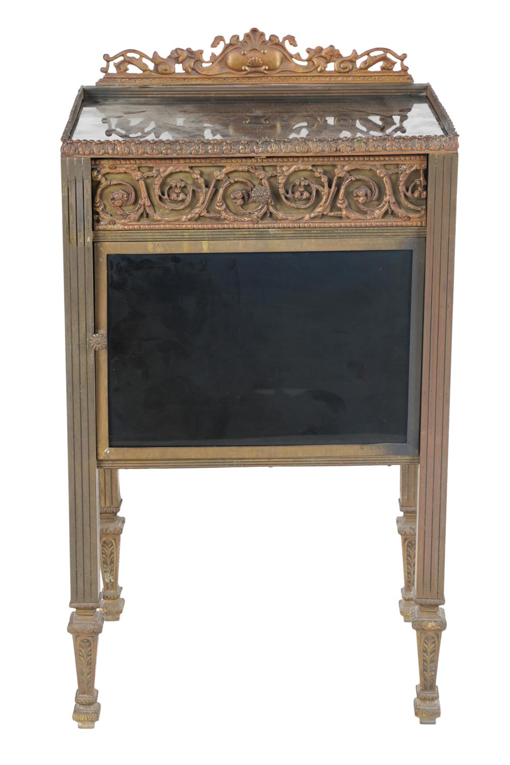 Appraisal: NEOCLASSIC STYLE METAL BEDSIDE CABINETglass gilt metal and wood having