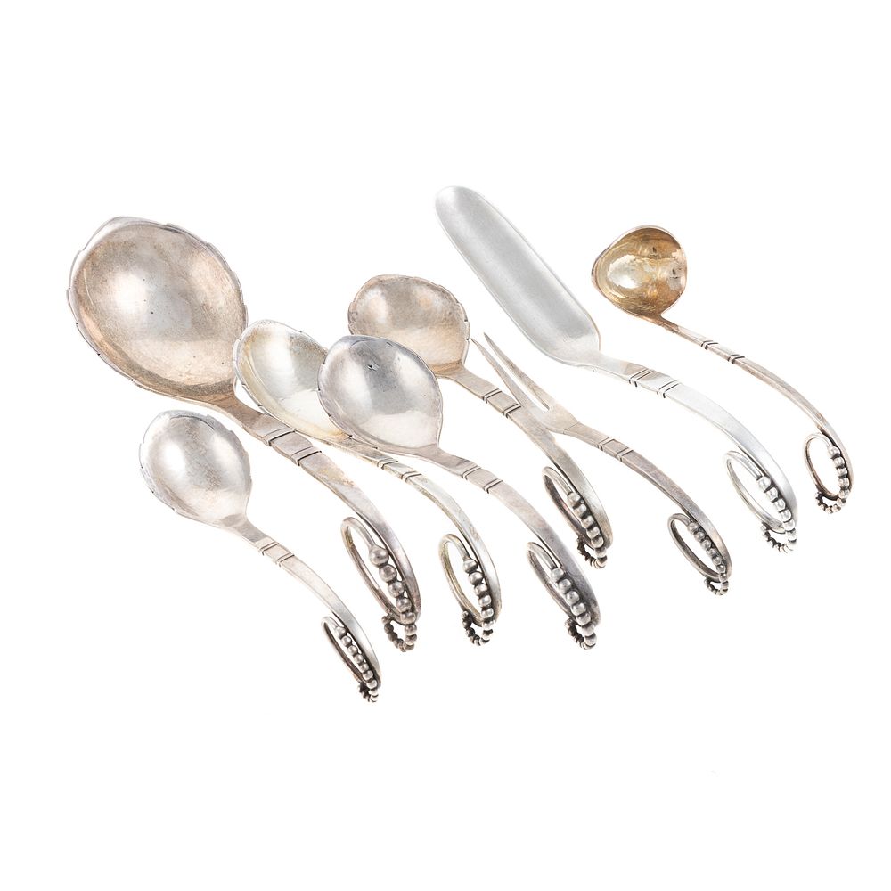 Appraisal: Eight Pieces Georg Jensen Sterling Flatware Pattern including a serving