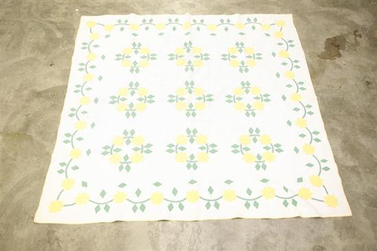 Appraisal: TWO QUILTS Both handsewn Pieced triangular pattern quilt in mainly