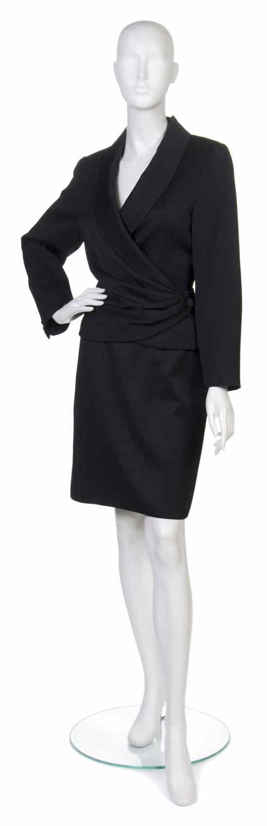 Appraisal: A Balenciaga Black Wool Skirt Suit in a wraparound style