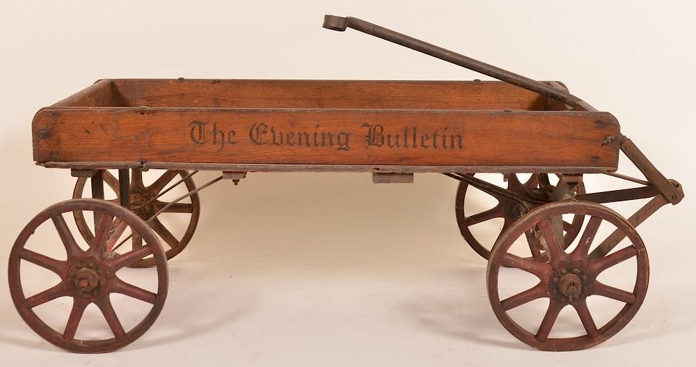 Appraisal: Wooden pull wagon The Evening Bulketin Wooden pull wagon The