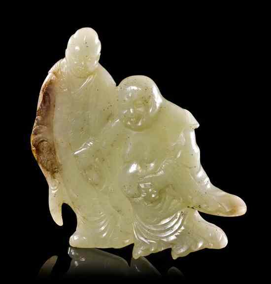 Appraisal: A Celadon Jade Figural Carving of celadon colored stone with