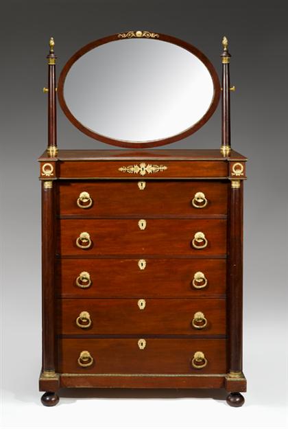 Appraisal: Empire gilt bronze mounted mahogany tall commode The oval mirror