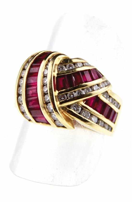 Appraisal: Diamond ruby and gold ring by Krypell twenty-eight channel-set baguette