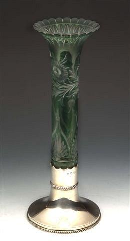 Appraisal: A SILVER MOUNTED CUT GLASS VASE green glass engraved with